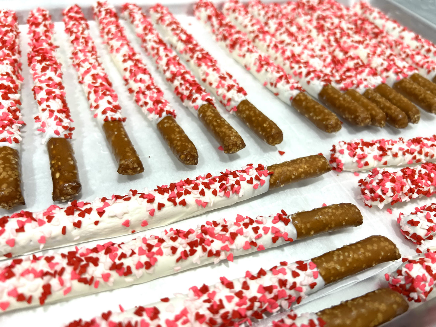 Valentine's Day White Chocolate Pretzel Rods with Heart Sprinkles
